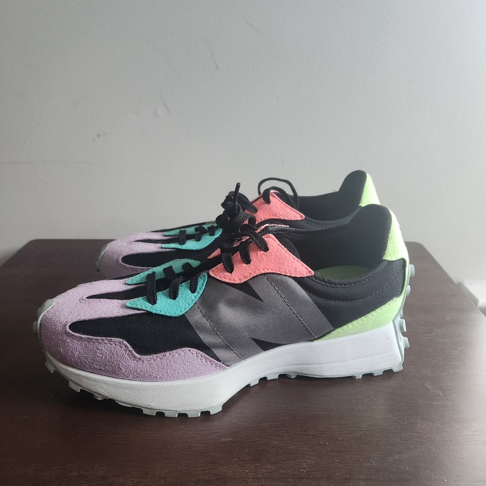 Used New Balance Women's 327 in the "Black Dark Violet" colorway. Worn One Time